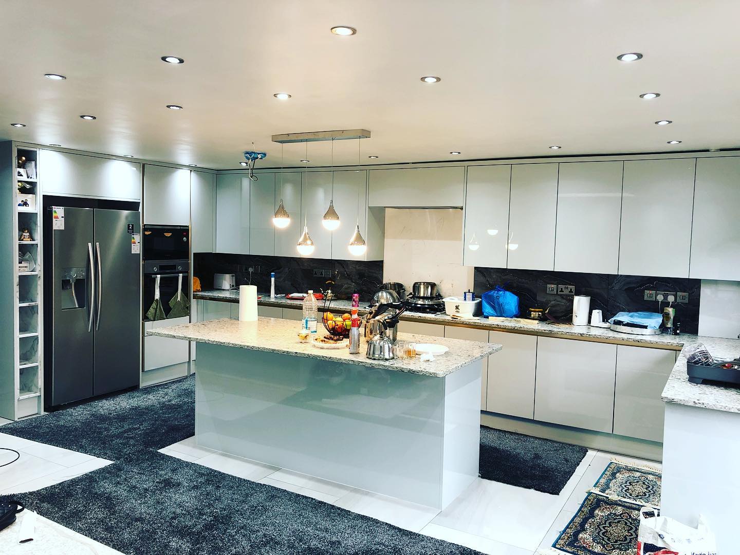 Modern fitted kitchen and island