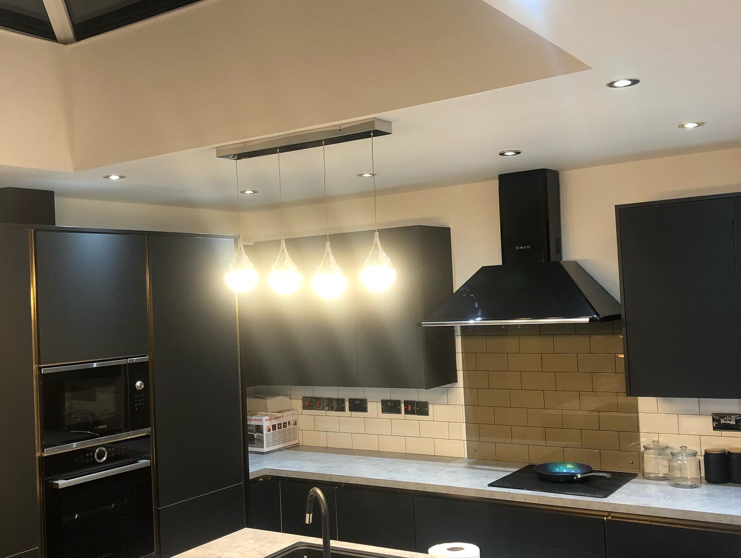 Dark contemporary kitchen cabinetry