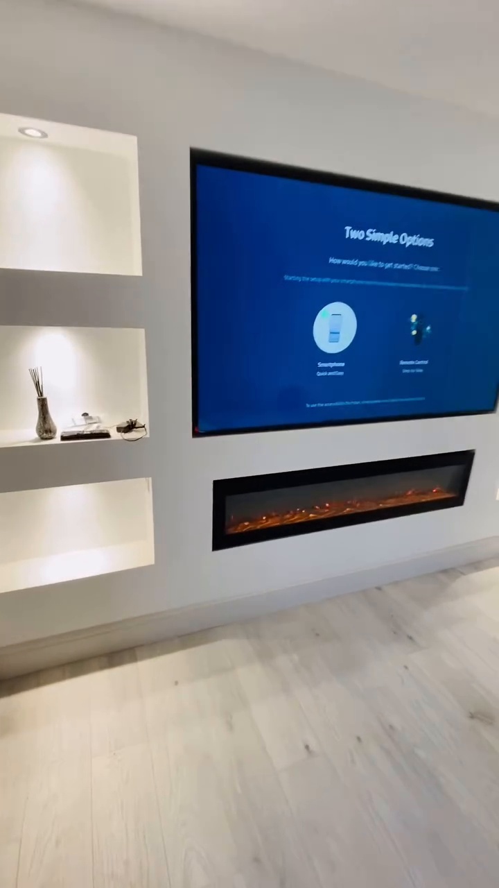 Integrated media wall with fitted storage and display lighting
