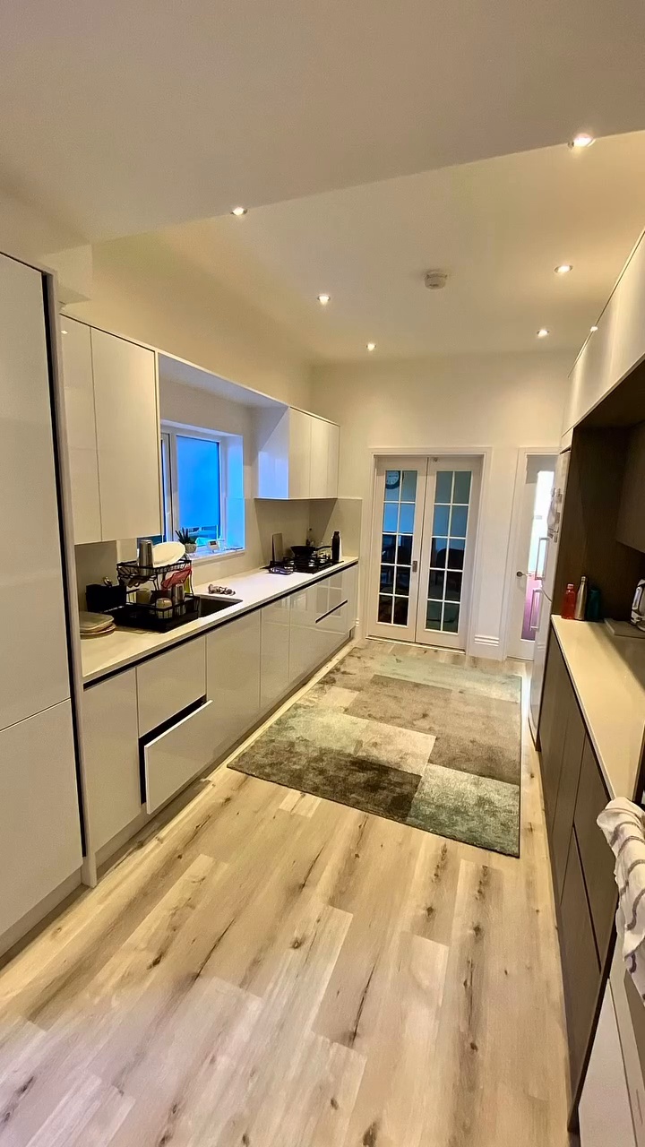 White and natural wood kitchen
